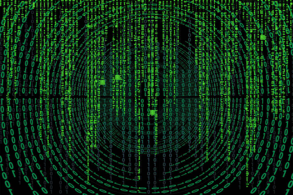 Image of green computer encrypted language and binary on a black background